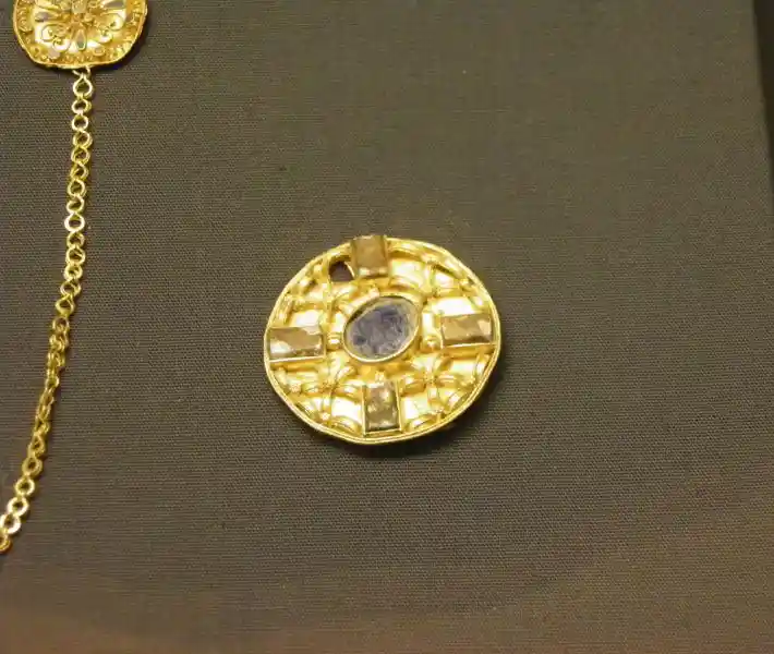 Disc brooch. Gold jewelry. May have been dedicated to Senuna